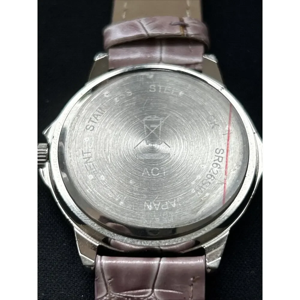 Silver Tone Pearlized Dial Purple Band Women’s Quartz Watch